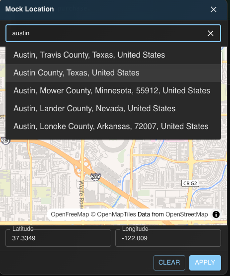 Setting a mock GPS location on a real device — search for any city or enter exact coordinates, then Apply.